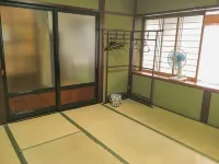 Guesthouse Rokudenasi JR和倉溫泉站附近的飯店