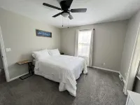 Newly remodeled,  handicap accessible overlooking pool , play area