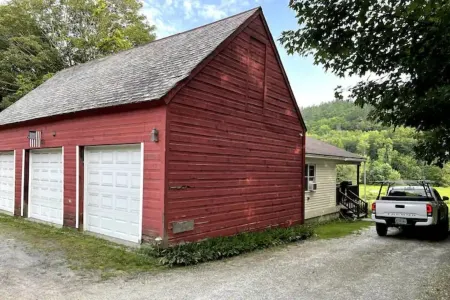 Village Home with 15 acre backyard on the river