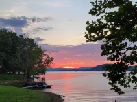 AUTHENTIC LAKEFRONT LOG CABIN-SLEEPS 10.  PRIVATE DOCK.  FIREPIT.