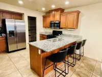 Spacious fully loaded 4-bedroom townhome sleeps 12 freeway access next to BYU Hotels in Springville