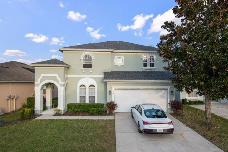 Enchanted villa near Disney, Universal, Legoland, and prestigious golf courses