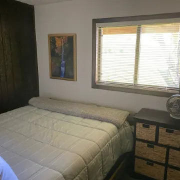 A wonderful, secluded 2 story cabin, deck, fire pit, stocked pond for fishing.