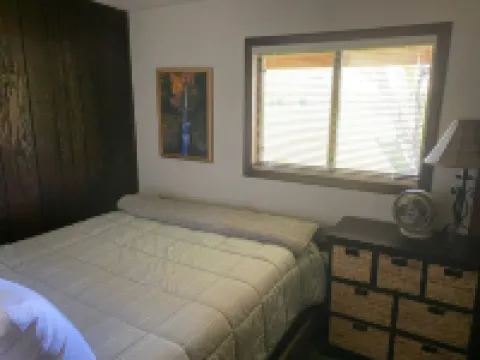 A wonderful, secluded 2 story cabin, deck, fire pit, stocked pond for fishing.