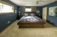 1.5 Miles from Bellaire, 8 from Torch Lake, two ponds and stream 10 acres.