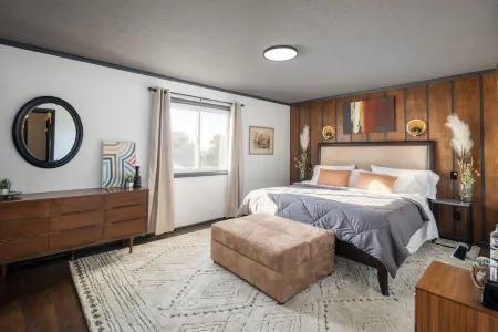 Cozy, pet friendly, Mid-Century style home loaded with books, movies, games.