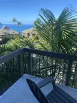 A Plush Two-level Condo with Ocean and Golf Course Views From its Lanais