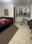 Hogan's Hideout Duplex #20 Jacuzzi Room is a relaxing, cozy room