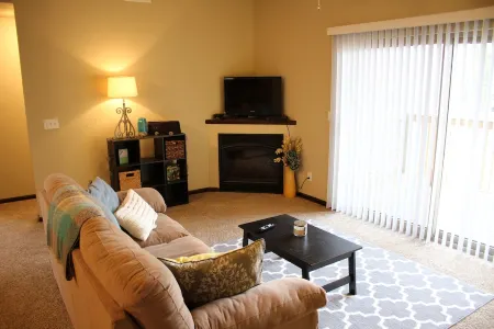 Cozy 2-bedroom condo in Waterloo south side with AC, WiFi & cable TV
