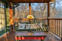 Creekfront Cabin with Waterfall. Hot Tub, Fire Pit, Gameroom, and more.