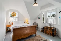 Relax and unwind in a tranquil space one block from the beach