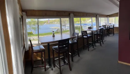 The Inn at Highland Lake, 2nd Floor, waterfront yard with a boat dock