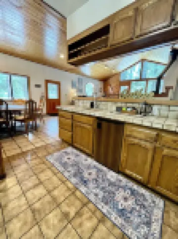 “Big Trees Retreat,” Boasts 5BR/2.5BA, Sleeps-16. 2-level living. Dog friendly!