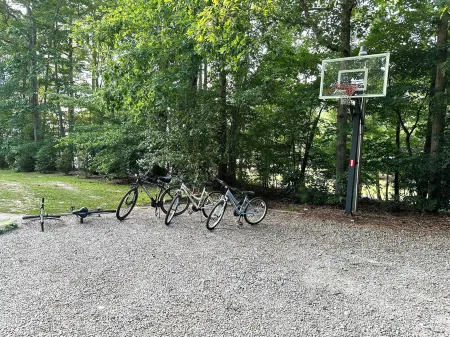 Spectacular Main Lake Sunsets from spacious 4 BR, 3800 sq ft, 1-acre point lot