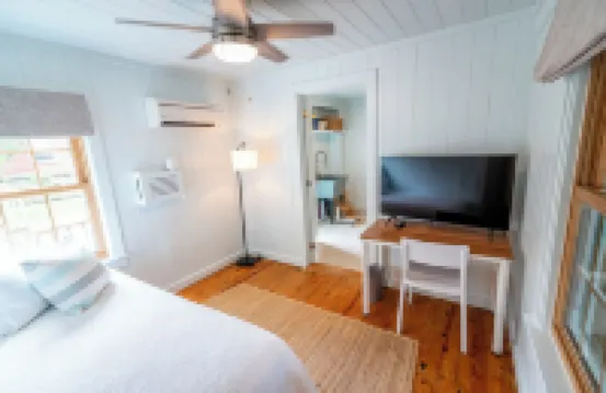 Classic Pawleys. Just Renovated. Long, breezy porches. Steps to beach and creek.