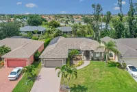 Beautiful updated home with new saltwater pool/lanai, and close to the beaches!