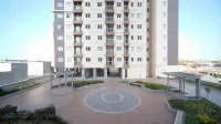 Cozy Living and Tidy 2Br at Puncak Dharmahusada Apartment Hotels in Tambaksari