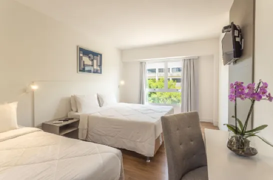 ATH Hotel - Américas Townhouse Отели рядом с достопримечательностью «Парк Дош Атлеташ»