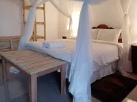 Restaurante Calor Tropical Hotel dekat Portuguese Island