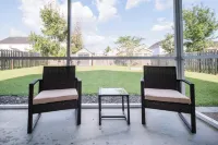 Charming 3-bedroom oasis in lovely Pooler with hot tub, king bed,  and Smart TVs