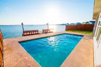 Luxury Waterfront Rockport Villa with private pool and fishing dock