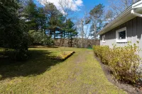 Lakefront Home with Porch, Patio and Fenced Yard - Short Drive to Beach