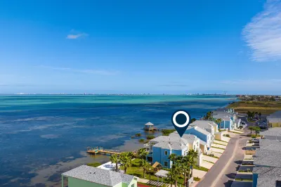 Bayfront Home with Shared Pool, Dock, Balcony, Playground and Washer/Dryer