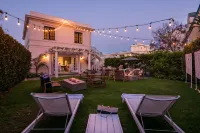 Elegant Outdoor Dining and Designer Furnishings - Luxurious Beach Escape