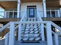 Rooftop Deck and Fenced Yard - Stylish Coastal Haven