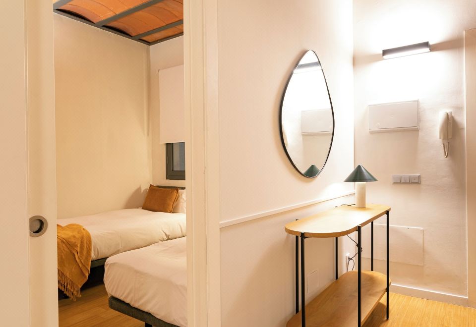 Aspasios Las Ramblas Apartments의 아늑한 침실