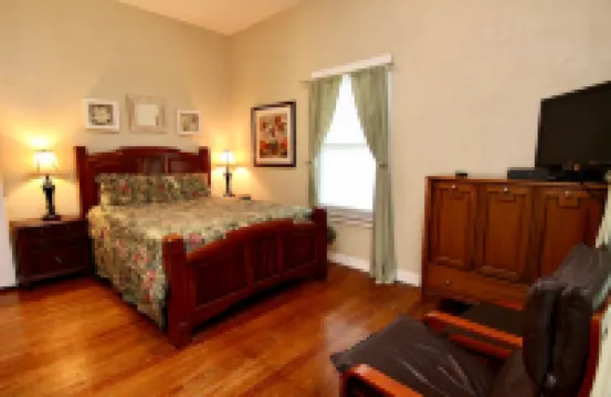 Private Backyard with Charcoal Grill and Porch - Charming Cozy Haven