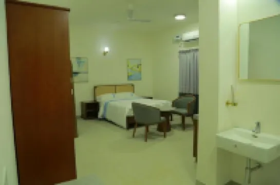 RS Honey Stay Hotels near Old Coutralam Falls