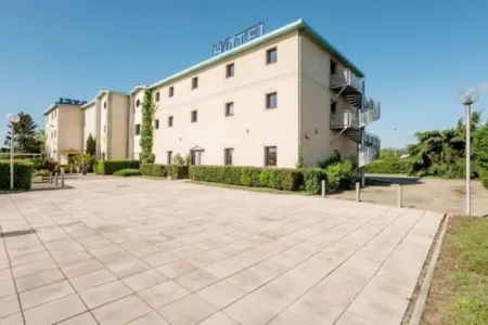 Hotel le Saint Vincent Lyon Sud Отели в г. Шарли