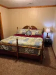 4-bedroom cabin in peaceful Apple Valley with AC, WiFi. Enjoy nature retreat.