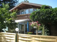 large apartment near the North Sea with conservatory, fireplace, sauna