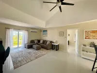 Newly Built 2-Bedroom Villa Short Walk From Beach & Minutes away from Airport! Hotels in Moss Town