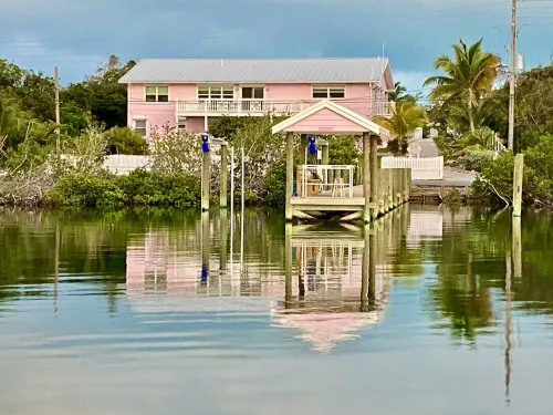 Pink Bikini Island Cottage with a dock on Black Sound