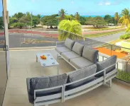Gorgeous Eagle Beach 4-bedroom Condo with surround balcony and fitness room