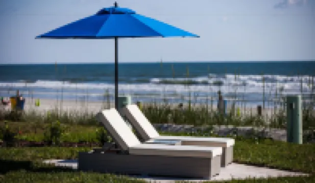 The Salty Mermaid Oceanfront Hotel