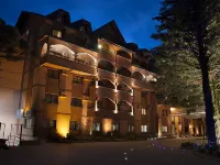 格拉瑪多主人酒店 鄰近Serra Park - Centro de feiras e eventos的酒店