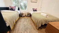 Spacious 4-bedroom house with AC, WiFi in cool Huntington Beach