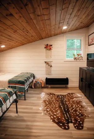 Modern mountain- inspired monoslope home located in the beautiful Northwoods