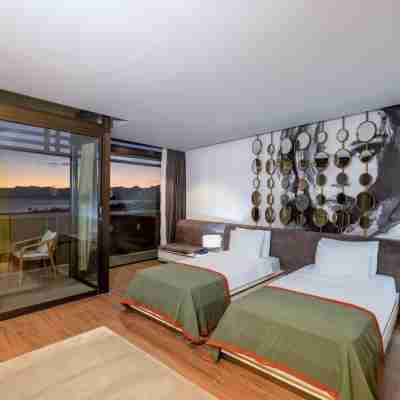 Nirvana Cosmopolitan Hotel - Convention & Sports Center Rooms