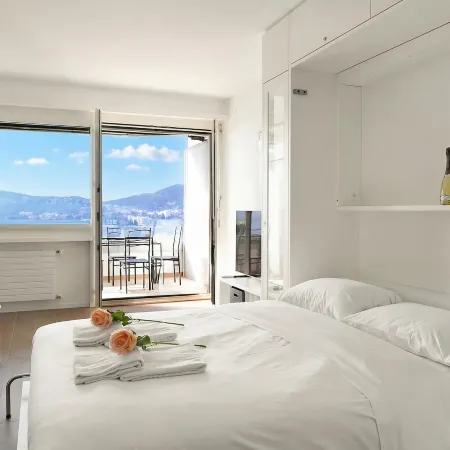 View and Art | Panoramic Lake View Studio, Lugano - Happy Rentals