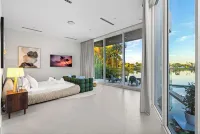 Signature Waterfront Villa by the Glamhomes