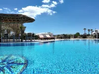 Villa Harmony Hotel berhampiran Pantai Plaka