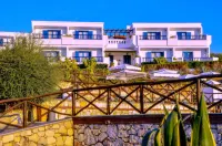 Agionissi Resort Hotels near Camping Delphini