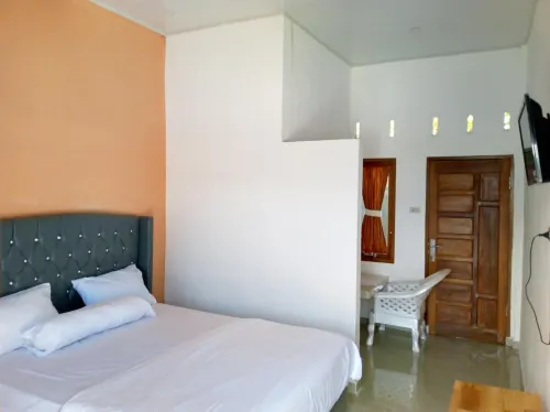 RedDoorz @ Sihole Paradise Inn Parbaba فنادق في Simarmata