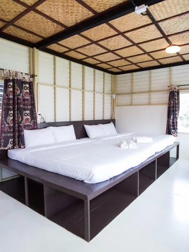 รูปภาพของกระท่อมสาธุ Garden Cottage ที่พักใจกลางย่านเก่าโพธาราม (ย่านถนนน่าเดิน)