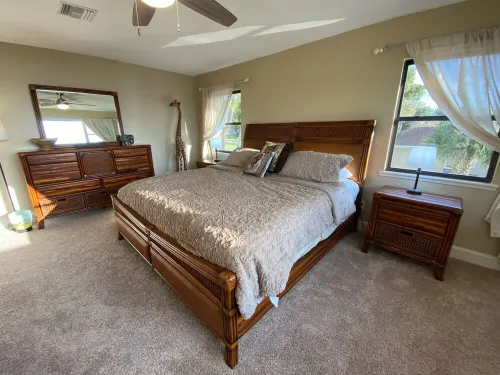 Watch Florida sunsets from the covered lakefront dock Hotels in Minneola